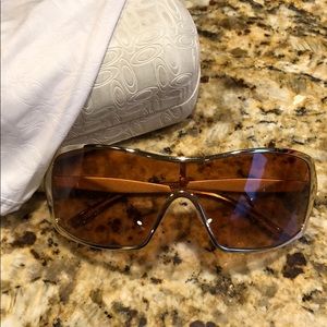 Oakley sunglasses. Gold rim, tan lense. Used.